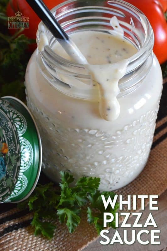 Looking to switch up your homemade pizza? Try switching out the tomato sauce for this White Pizza Sauce! Prepared with lots of garlic, cream, and parmesan, you might want to skip the toppings completely! #pizza #pizzasauce #whitepizza #whitepizzasauce #garlicsauce