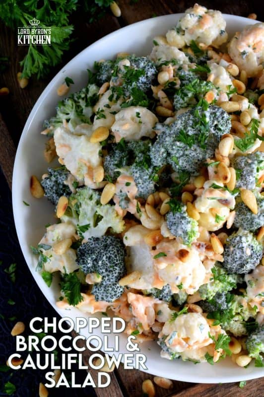 Vegetables never tasted so good! Chopped Broccoli and Cauliflower Salad is creamy, cheesy, and crunchy. Bacon tends to be a dominant flavour, so this version has none. This salad is that good! #broccolisalad #choppedsalad #broccoli #cauliflower #meatlessmonday