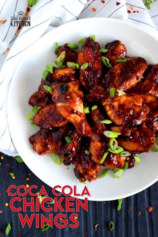 A can of Coke helps to sweeten and thicken this gorgeous and delicious sauce. Coca Cola Chicken Wings are the ultimate sticky, finger-licking, game-time appetizer. Who am I kidding!? These are perfect any time you choose to eat them - game or not! #coke #cocacola #cola #chicken #wings #gametime #appetizer