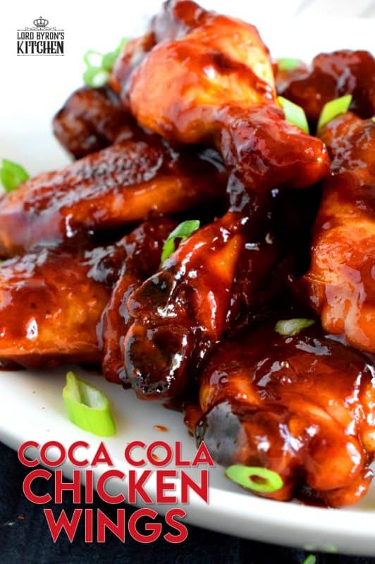 A can of Coke helps to sweeten and thicken this gorgeous and delicious sauce. Coca Cola Chicken Wings are the ultimate sticky, finger-licking, game-time appetizer. Who am I kidding!? These are perfect any time you choose to eat them - game or not! #coke #cocacola #cola #chicken #wings #gametime #appetizer