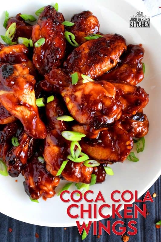 A can of Coke helps to sweeten and thicken this gorgeous and delicious sauce. Coca Cola Chicken Wings are the ultimate sticky, finger-licking, game-time appetizer. Who am I kidding!? These are perfect any time you choose to eat them - game or not! #coke #cocacola #cola #chicken #wings #gametime #appetizer