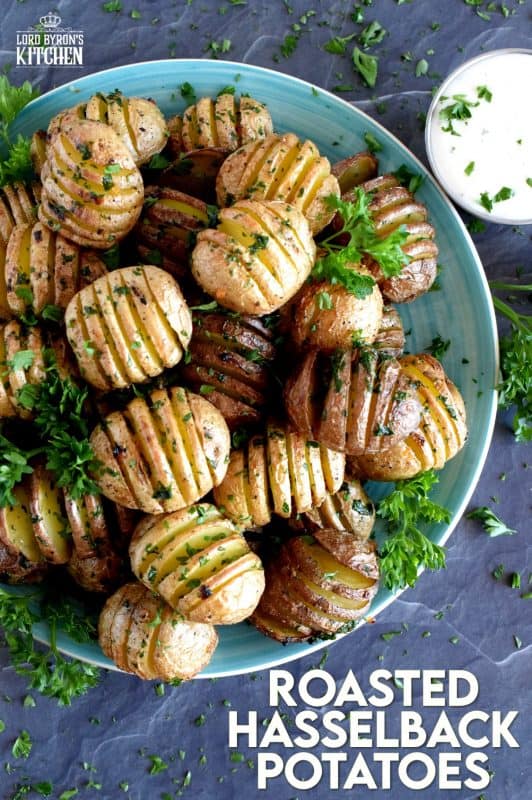 A beautiful side dish, a great little appetizer, or eat them all and call it a main! Roasted Hasselback Potatoes are fast and easy, budget-friendly, and oh, so delicious! I bet you can't eat just one! #babypotatoes #sidedishes #hasselback #bakedpotato
