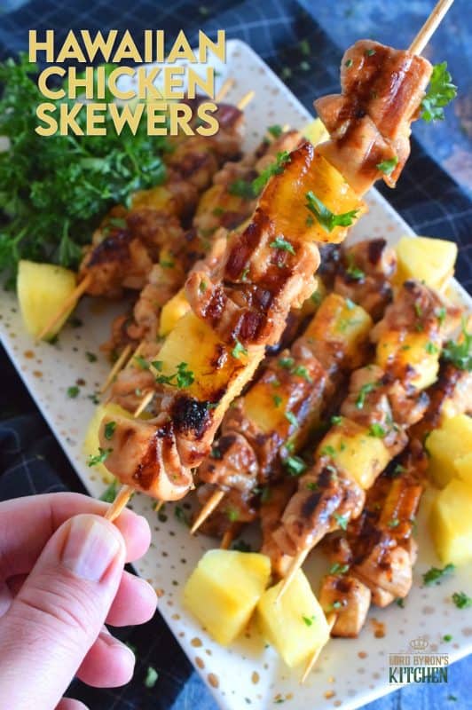 Hawaiian Chicken Skewers are prepared by marinating chicken thighs in mixture of pineapple juice, soy sauce, ginger, garlic, and dry mustard. Grilled to perfection, with chunks of fresh pineapple, these chicken skewers are absolutely phenomenal! #hawaiian #chicken #pineapple #marinated #skewers #grilledchicken #summer #grilling