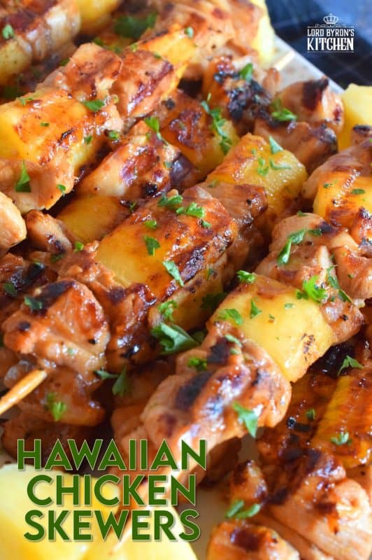Hawaiian Chicken Skewers are prepared by marinating chicken thighs in mixture of pineapple juice, soy sauce, ginger, garlic, and dry mustard. Grilled to perfection, with chunks of fresh pineapple, these chicken skewers are absolutely phenomenal! #hawaiian #chicken #pineapple #marinated #skewers #grilledchicken #summer #grilling