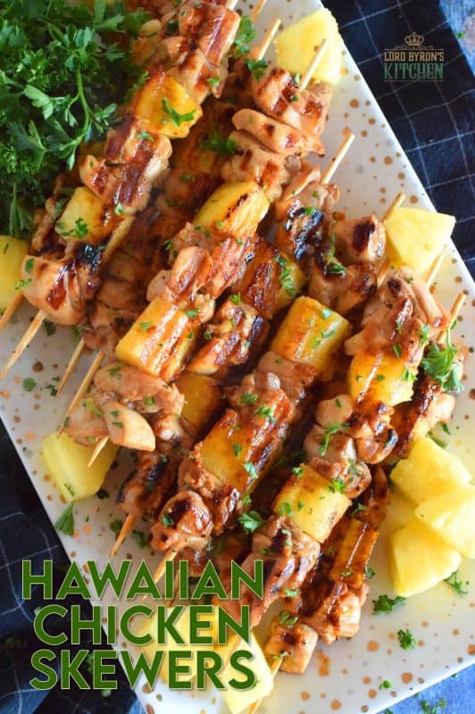 Hawaiian Chicken Skewers are prepared by marinating chicken thighs in mixture of pineapple juice, soy sauce, ginger, garlic, and dry mustard. Grilled to perfection, with chunks of fresh pineapple, these chicken skewers are absolutely phenomenal! #hawaiian #chicken #pineapple #marinated #skewers #grilledchicken #summer #grilling
