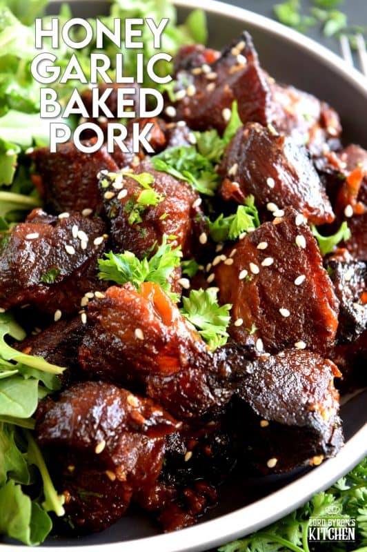 Moist and tender, with charred bits too, these Honey Garlic Baked Pork Bites are delicious and easy to prepare. Despite the long cooking time, this main is perfect for a family dinner anytime. Sweet and garlicky, with an optional kick of spice and heat. Yum! #pork #baked #bites #honey #garlic