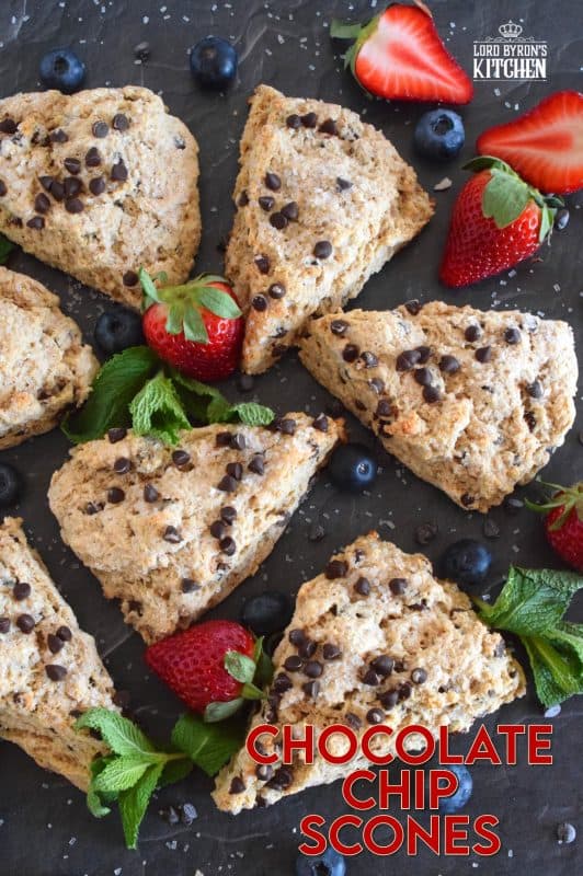 A scone for both the little kids in your life, and the adults that live their lives like a kid, Chocolate Chip Scones are sweeter than regular scones. With a good splash of vanilla, loads of milk chocolate chips, and a sprinkling of coarse sugar on top, these scones are an absolute treat. #chocolate #chocolatechip #scones #basicrecipes #easyscones #sconerecipe