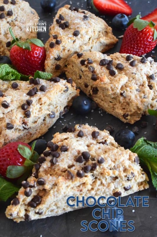 A scone for both the little kids in your life, and the adults that live their lives like a kid, Chocolate Chip Scones are sweeter than regular scones. With a good splash of vanilla, loads of milk chocolate chips, and a sprinkling of coarse sugar on top, these scones are an absolute treat. #chocolate #chocolatechip #scones #basicrecipes #easyscones #sconerecipe
