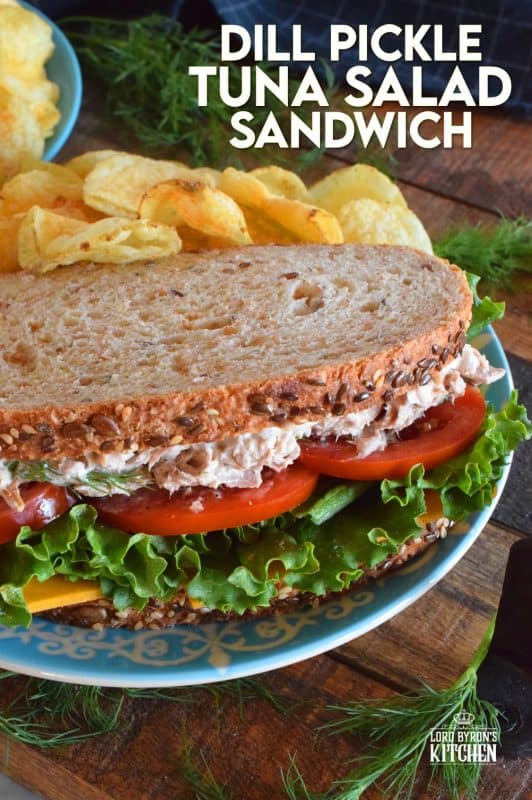 Who has time for boring sandwiches? You won't find that here, and this Dill Pickle Tuna Salad Sandwich is making sure of it! The tuna is prepared with dill pickles and fresh dill for maximum dill flavour. Finish it off with a slice of cheese, crisp lettuce, and sliced tomatoes all on great-tasting, multi-grain bread! #tuna #tunasalad #tunasandwich #dill #dillpickles #sandwiches