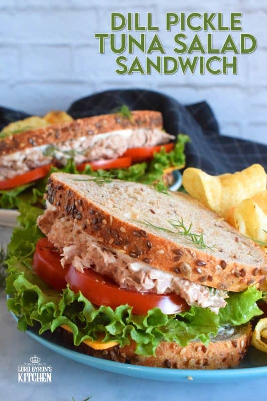 Who has time for boring sandwiches? You won't find that here, and this Dill Pickle Tuna Salad Sandwich is making sure of it! The tuna is prepared with dill pickles and fresh dill for maximum dill flavour. Finish it off with a slice of cheese, crisp lettuce, and sliced tomatoes all on great-tasting, multi-grain bread! #tuna #tunasalad #tunasandwich #dill #dillpickles #sandwiches