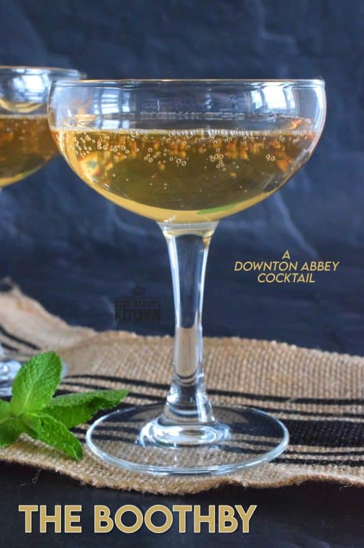 Another Downton Abbey inspired cocktail is on the menu today. This time, it's a chilled cocktail consisting of whiskey, dry vermouth, bitters, and sparking wine. Serve this beauty in a coupe glass for a full 1920s vibe. #cocktail #boothby #downtonabbey #coupe #sparklingwine #theresalwaystimeforacocktail