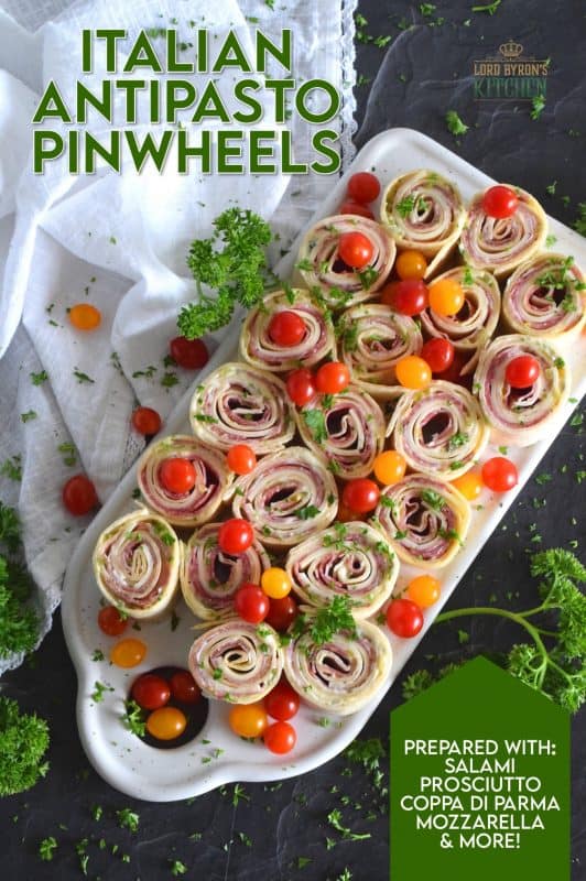 The ease of preparing pinwheel sandwiches is only eclipsed by their deliciousness. Italian Antipasto Pinwheels are filled with cheese and thinly sliced prosciutto, coppa di parma, and salami. With an easy homemade sauce, these are my new favourite appetizer! #pinwheels #sandwiches #italian #appetizers #antipasto