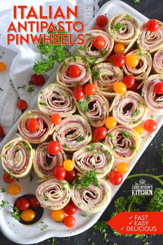 The ease of preparing pinwheel sandwiches is only eclipsed by their deliciousness. Italian Antipasto Pinwheels are filled with cheese and thinly sliced prosciutto, coppa di parma, and salami. With an easy homemade sauce, these are my new favourite appetizer! #pinwheels #sandwiches #italian #appetizers #antipasto