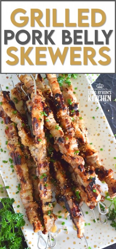 Marinated pork belly is skewered and grilled to perfection in this Asian-inspired recipe. The marinade tenderizes the pork and draws out some of the fat so that the pork can be grilled quickly on a high heat while keeping the meat moist and delicious. #pork #porkbelly #grilledpork #asian #skewers #kebabs #grilling #summer