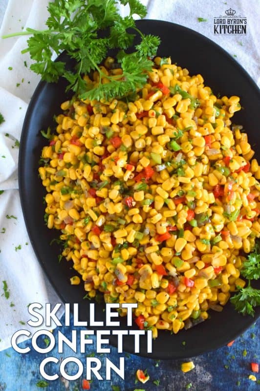 A bright, bold, and fresh summer side is right here! Skillet Confetti Corn is the most delicious summer side and it takes less than twenty minutes from start to finish. Sautéed in butter, corn is paired with bell peppers, red onions, jalapenos, and green onions. It's one of those sides you always wish you made more of! #corn #summer #summersides #confetti #salad #sidedish #vegetable #vegetarian