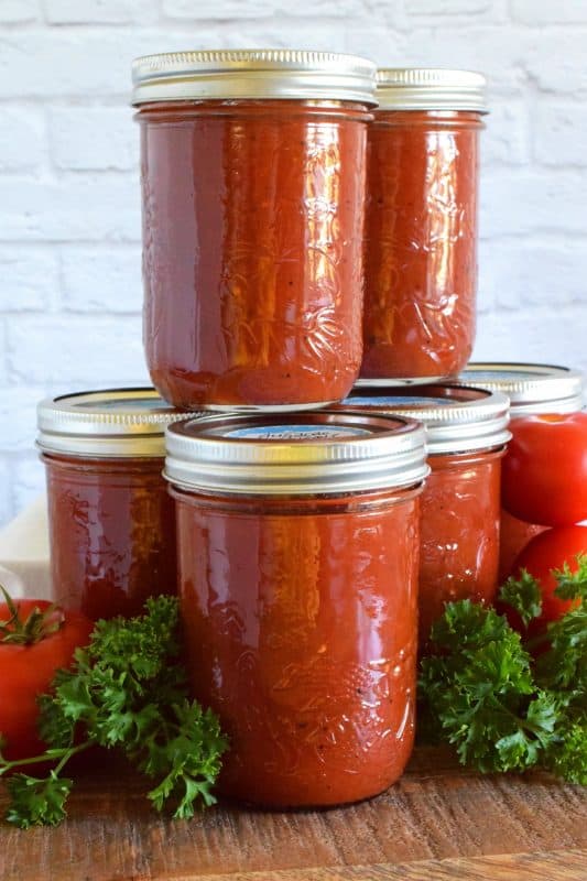 Unlike store-bought chunky salsa, Restaurant Style Canned Tomato Salsa, sometimes called Blender Salsa, is a smooth condiment that lends itself to more than just a dip for chips! #salsa #blender #canning #restaurant #style #smooth #homemade