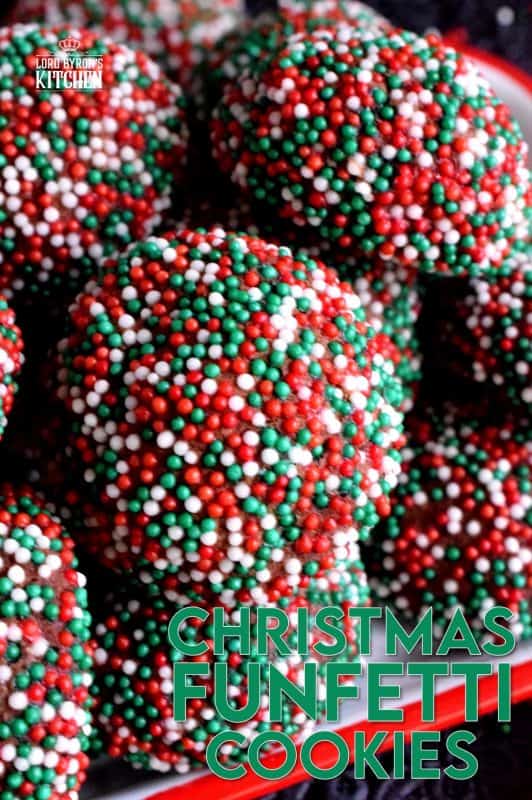 A simple mix, roll, and bake cookie with a deep, rich chocolate flavour. Christmas Funfetti Cookies are ideal for holiday baking with kids! These make a lovely gift idea too, because they can be packaged without much risk of crumbling! #christmas #holiday #baking #cookies #funfetti #chocolate #sprinkles #kids