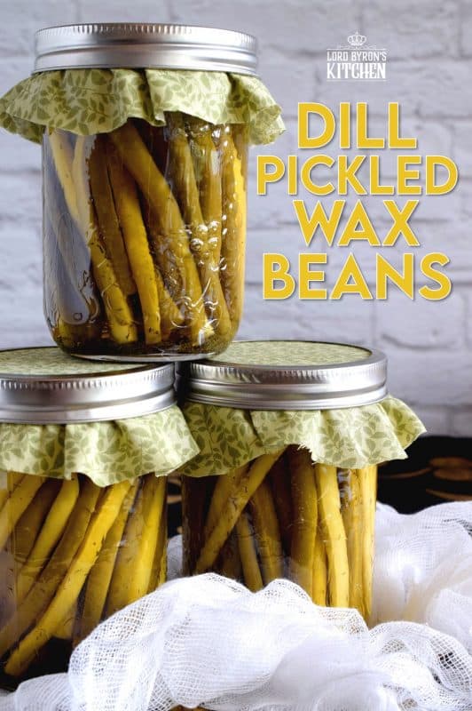 Dill Pickled Wax Beans are super dilly with a hint of salty and peppery flavour. Stock your pantry full of these for a great side dish ready to go at any time. These are perfect on a cheese board or wrapped with thinly sliced hot salami! #pickled #preserved #canning #waxbeans #dillpickle