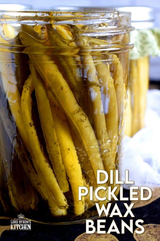 Dill Pickled Wax Beans are super dilly with a hint of salty and peppery flavour. Stock your pantry full of these for a great side dish ready to go at any time. These are perfect on a cheese board or wrapped with thinly sliced hot salami! #pickled #preserved #canning #waxbeans #dillpickle