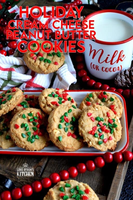 Nostalgia gets an update with these Holiday Cream Cheese Peanut Butter Cookies. Take a classic peanut butter cookie and add cream cheese to get a lighter, flakier, tastier update on your favourite childhood cookie. Don't worry, the cream cheese does not take away any of that delicious peanut butter flavour! #holiday #christmas #baking #peanutbutter #creamcheese #cookies #sprinkles