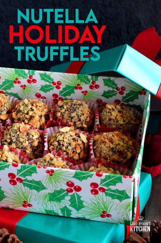 Holiday baking should be delicious, indulgent, and easy! Nutella Holiday Truffles are all of those things and more! They're delectable, luxurious, succulent, tantalizing, and delightful! If that description doesn't convince you to make this, nothing will! #christmas #holiday #nobake #truffles #balls #nutella