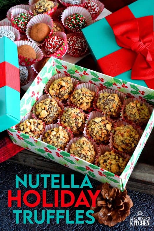 Holiday baking should be delicious, indulgent, and easy! Nutella Holiday Truffles are all of those things and more! They're delectable, luxurious, succulent, tantalizing, and delightful! If that description doesn't convince you to make this, nothing will! #christmas #holiday #nobake #truffles #balls #nutella