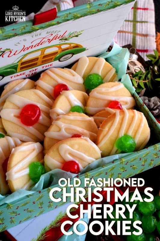 Old Fashioned Christmas Cherry Cookies are sugary, buttery, shortbread cookies, topped with royal icing and a festive candied cherry center. Not only do they look vintage, they also look really delicious, don't they!? #shortbread #cookies #christmas #holiday #baking #cherry #oldfashioned #glazed