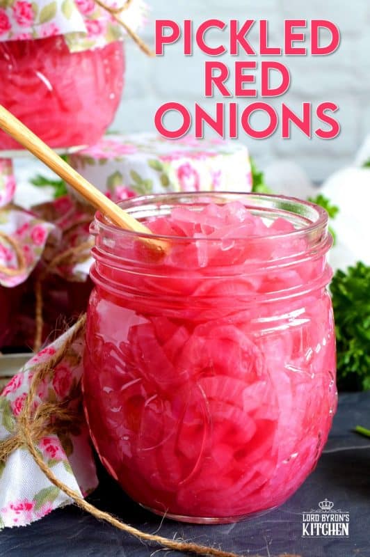 Pickled Red Onions are not only gorgeous to look at, they are delightfully tasty as well! Bright and crisp, a great addition to almost anything, and super easy to make; you'll want to keep a jar in your fridge at all times! #pickled #redonions #red #onions #preserved