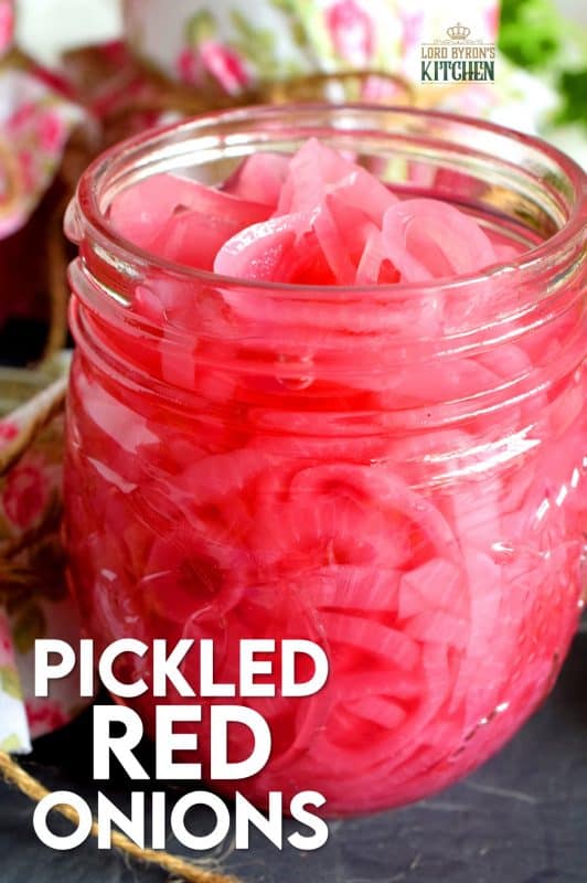 Pickled Red Onions are not only gorgeous to look at, they are delightfully tasty as well! Bright and crisp, a great addition to almost anything, and super easy to make; you'll want to keep a jar in your fridge at all times! #pickled #redonions #red #onions #preserved