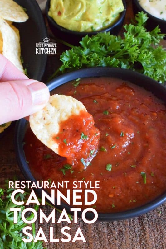 Unlike store-bought chunky salsa, Restaurant Style Canned Tomato Salsa, sometimes called Blender Salsa, is a smooth condiment that lends itself to more than just a dip for chips! #salsa #blender #canning #restaurant #style #smooth #homemade