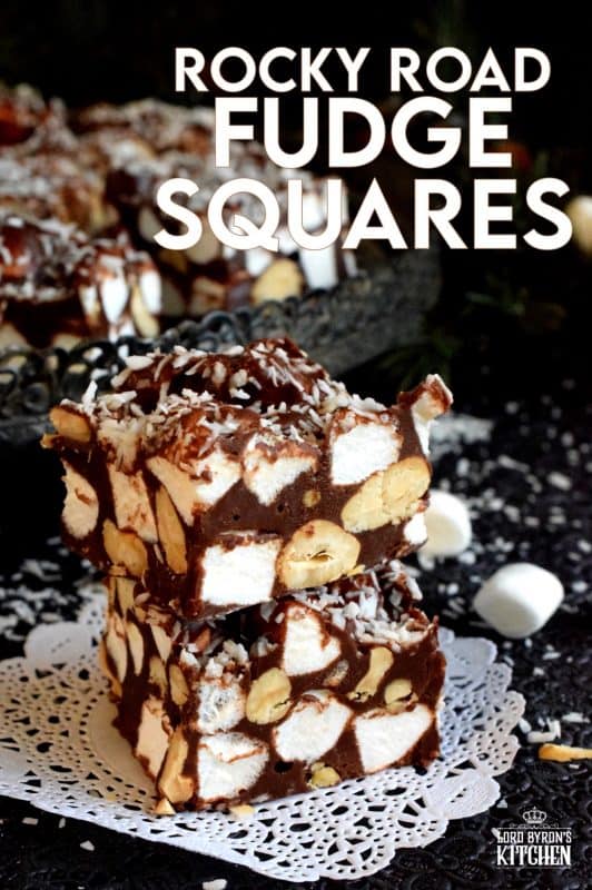Homemade sweet treats can’t get any easier than a fudge recipe. Rocky Road Fudge Squares combines traditional Rocky Road ingredients like chocolate, nuts, and marshmallows. These are so delicious when served chilled right from the fridge! #christmas #holiday #nobake #recipes #chocolate #rockyroad