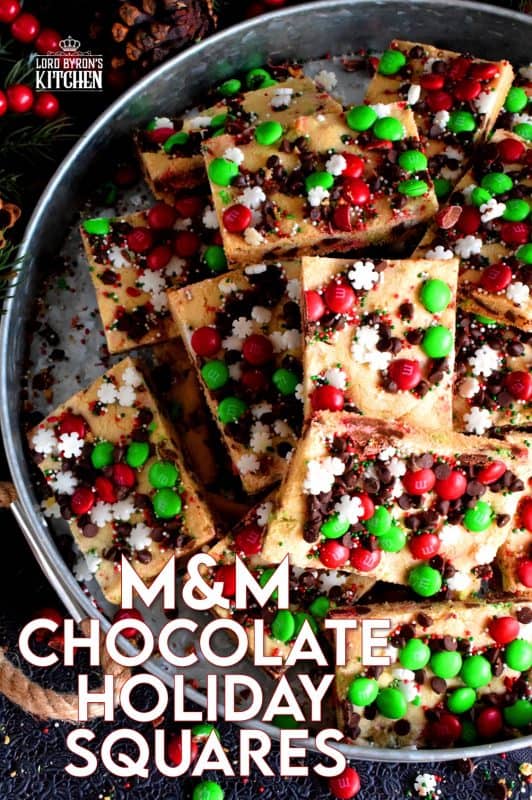 Fast, simple, and easy – just the way Christmas baking should be! Sheet Pan M&M Chocolate Holiday Bars are festive, fun, and family-friendly! Baking cookies in a sheet pan like this, is much faster than baking one tray at a time! #christmas #holiday #baking #cookies #candy #m&m #sheetpan