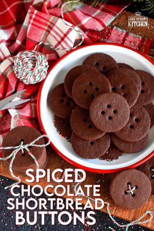 Chocolate that has been spiced with the heat of chilies is a popular confection, which makes these Spiced Chocolate Shortbread Buttons a must have! Punching holes to make buttons in the cookies before baking is cute, but not a must!! #chocolate #shortbread #cookies #Mexican #spicy #spiced #christmas #holiday #baking