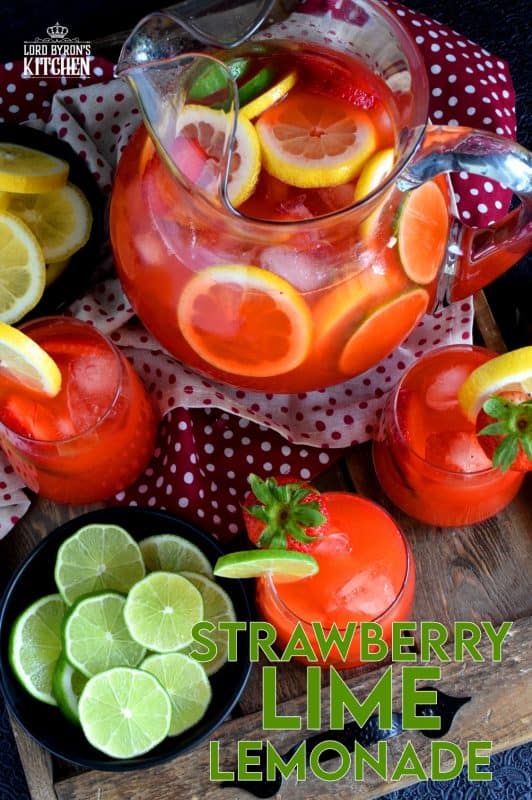 A refreshing summer drink made with simple syrup, whole strawberries, lime and lemon juice. If you're looking to up your lemonade game, this one is for you! #strawberry #lime #limeade #lemonade #juice #summer #drink #punch
