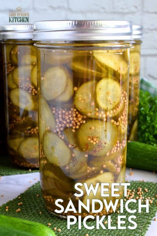 Every sandwich needs a pickle! Preserve your own Sweet Sandwich Pickles using a water bath canning method - easy and inexpensive too! Both zucchini and cucumbers will work in this recipe! #pickles #canned #sweet #preserves