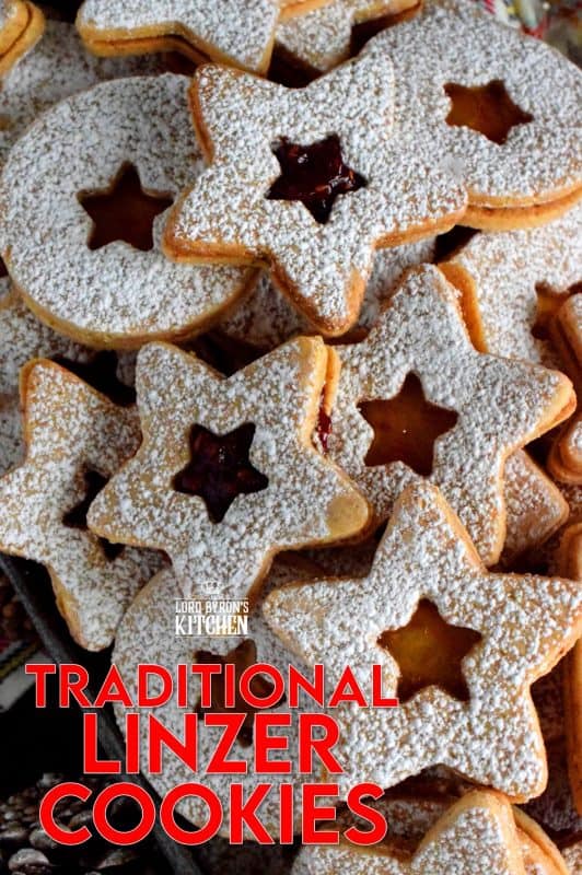 Christmas is all about tradition, both the new traditions and the old. This Traditional Christmas Linzer Cookies recipe, an old world cookie confection, originating in Austria, is a vital part of holiday traditions for many families. Also, they look impressive, but they are so simple to make! #linzer #traditional #christmas #holiday #baking #cookies