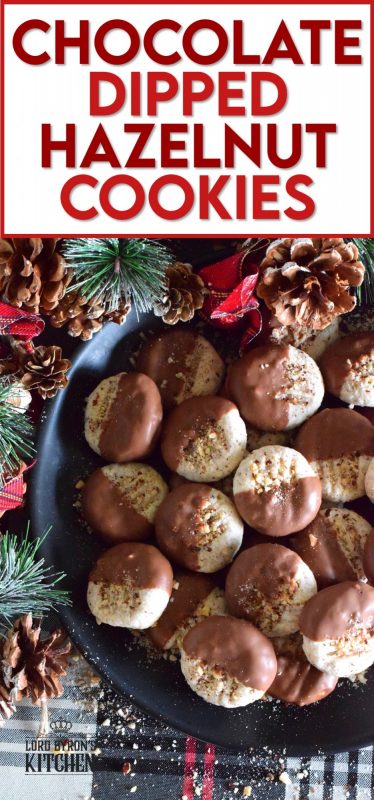 Ground hazelnuts, butter, sugar, and chocolate - what more is there to say? Chocolate Dipped Hazelnut Cookies have deep nutty flavour, a great texture, and bit of indulgence. One batch will never do! #chocolatedipped #hazenut #nut #chocolate #cookies #christmas #holiday #baking