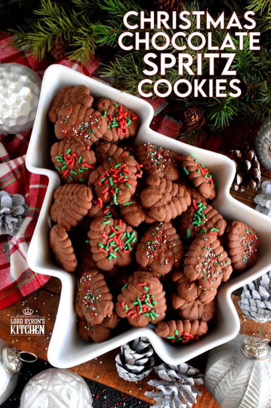 When it comes to baking with the purpose of gift giving, a Christmas Chocolate Spritz Cookie is the best way to go, especially if they have sprinkles! Everyone loves spritz cookies; they're so easy to make and one batch makes a lot of cookies! #spritz #cookies #press #holiday #christmas #chocolate #baking