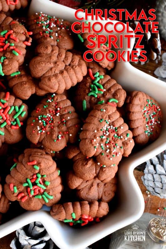When it comes to baking with the purpose of gift giving, a Christmas Chocolate Spritz Cookie is the best way to go, especially if they have sprinkles! Everyone loves spritz cookies; they're so easy to make and one batch makes a lot of cookies! #spritz #cookies #press #holiday #christmas #chocolate #baking