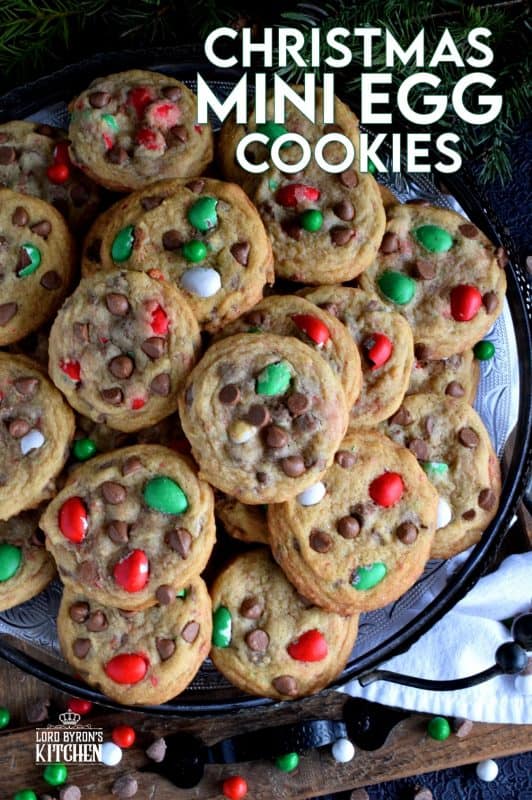 This recipe upgrades classic chocolate chip cookies with Christmas-themed mini eggs - festive, delicious, and addictive too! These cookies are for the serious chocolate lover, because these are loaded to the max with milk chocolate goodness! #cadbury #hershey #eggies #minieggs #christmas #holiday #baking