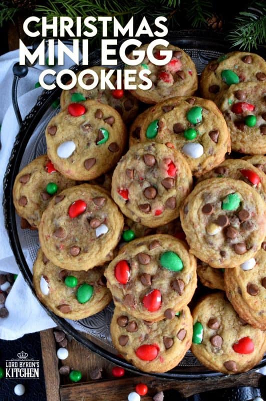 This recipe upgrades classic chocolate chip cookies with Christmas-themed mini eggs - festive, delicious, and addictive too! These cookies are for the serious chocolate lover, because these are loaded to the max with milk chocolate goodness! #cadbury #hershey #eggies #minieggs #christmas #holiday #baking