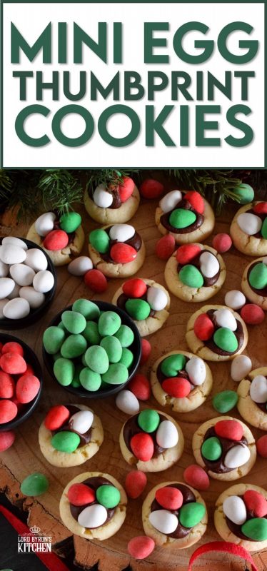 These are made using a classic thumbprint cookie dough, which is stuffed with a creamy chocolate frosting, and topped with mini eggs. There's no doubt that Christmas Mini Egg Thumbprint Cookies will be the first cookie to disappear from your cookie platter! #minieggs #cadbury #hershey #christmas #holiday #baking #thumbprint #cookies
