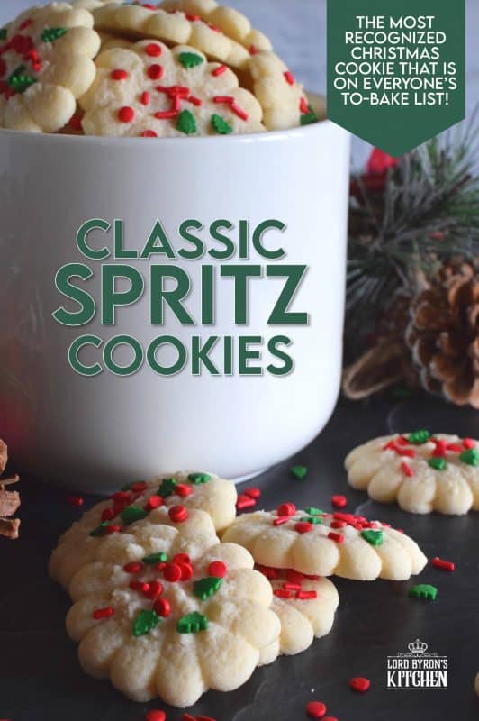 Simple and rustic is the way to go with these super buttery and tender Classic Spritz Cookies. A melt in your mouth cookie with festive sprinkles for fun and folly! These are the quintessential Christmas cookie!! #classic #spritz #cookies #christmas #holiday #baking #spritzer #press #sprinkles