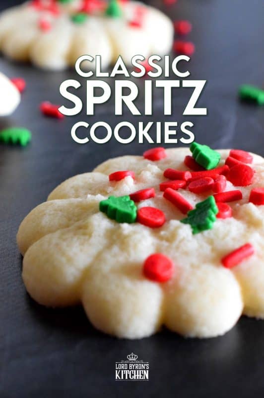 Simple and rustic is the way to go with these super buttery and tender Classic Spritz Cookies. A melt in your mouth cookie with festive sprinkles for fun and folly! These are the quintessential Christmas cookie!! #classic #spritz #cookies #christmas #holiday #baking #spritzer #press #sprinkles