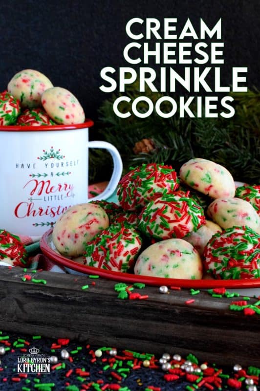 Who doesn't love cheerful and festive Christmas cookies with lots of sprinkles? Made with cream cheese, these will stay soft and moist much longer than most cookies. They're very easy to make and they taste as great as they look! #sprinkles #cookies #baking #christmas #holiday #balls