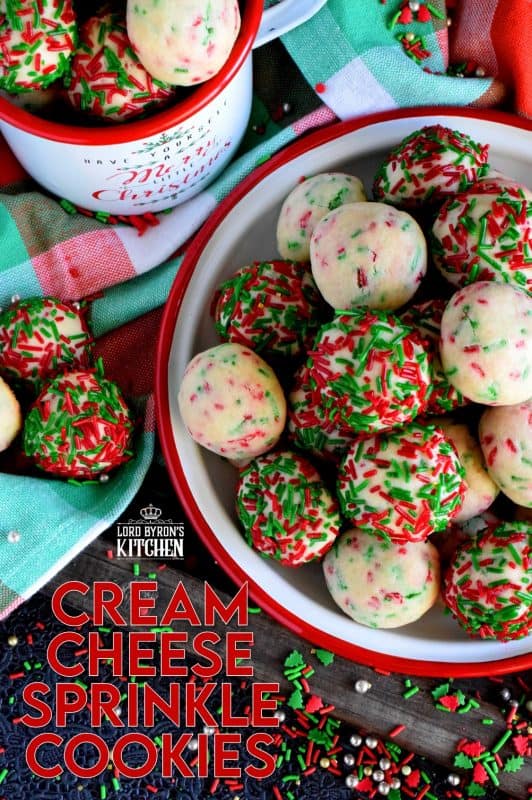 Who doesn't love cheerful and festive Christmas cookies with lots of sprinkles? Made with cream cheese, these will stay soft and moist much longer than most cookies. They're very easy to make and they taste as great as they look! #sprinkles #cookies #baking #christmas #holiday #balls