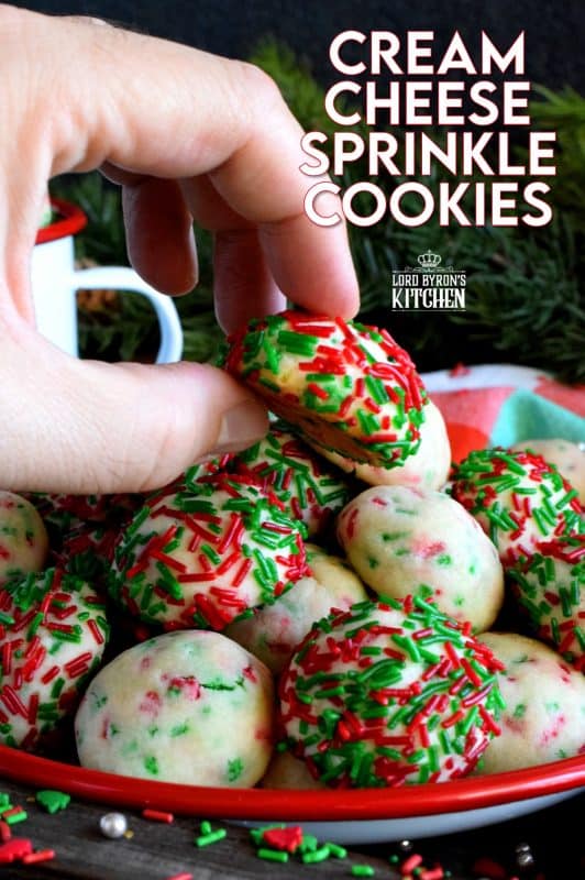 Who doesn't love cheerful and festive Christmas cookies with lots of sprinkles? Made with cream cheese, these will stay soft and moist much longer than most cookies. They're very easy to make and they taste as great as they look! #sprinkles #cookies #baking #christmas #holiday #balls