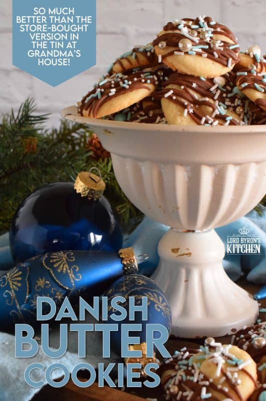 Melt in your mouth Danish Butter Cookies taste just like those cookies in the blue tin at your grandma's house. These are drizzled with milk chocolate, because everything at Christmastime should be over the top! #danish #butter #cookies #christmas #holiday #baking #dansk