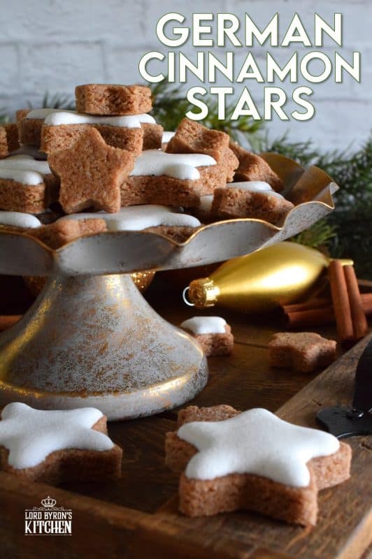 Ground almonds and cinnamon help to create the base of this traditional Christmas cookie. Meringue glazed German Cinnamon Stars are bound to be a new family favourite! It goes without saying that these cookies are simply stunning and surprisingly, they're so easy to make! #german #meringue #cinnamon #stars #christmas #holiday #baking #cookies