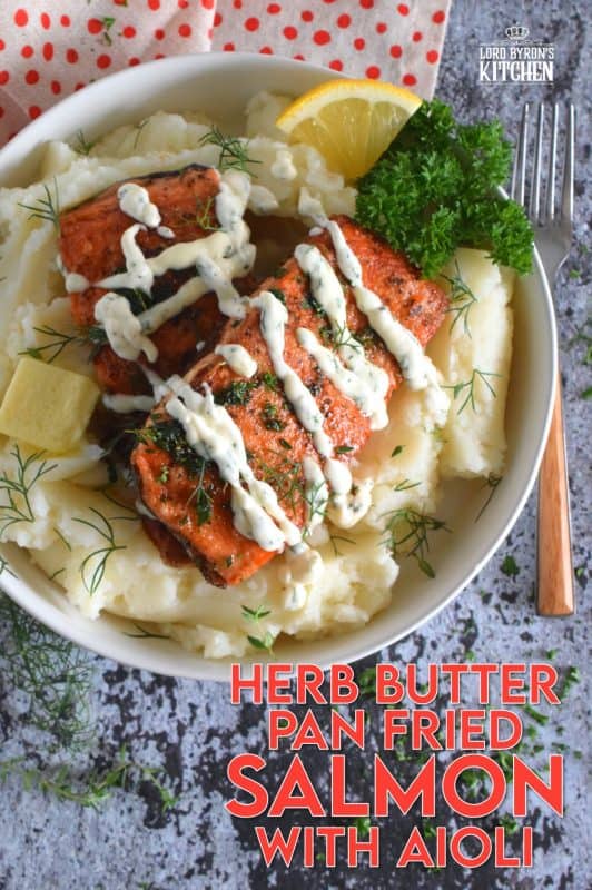No doubt you have heard the expression that simple is best. In the case of this Herb Butter Pan Fried Salmon with Aioli, the expression most certainly applies! Salmon fillets are perfectly fried and topped with a fresh herb butter and drizzled with a delicious and easy to prepare aioli. #salmon #aioli #panfried #seafood #friedsalmon #butter #friedinbutter